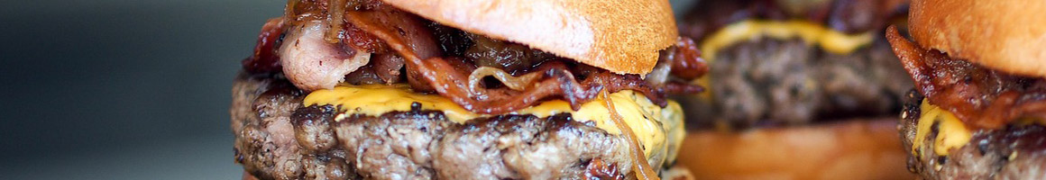 Eating American (New) Burger at Burger Up restaurant in Nashville, TN.